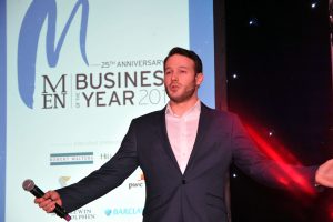 Manchester Corporate Entertainment Aaron Calvert on stage at Manchester Business Awards